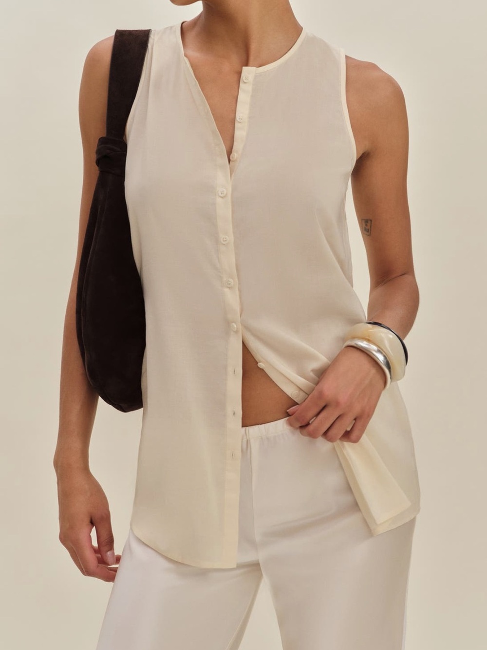Reformation Floria Sleeveless Button-Down Shell Top in Cream